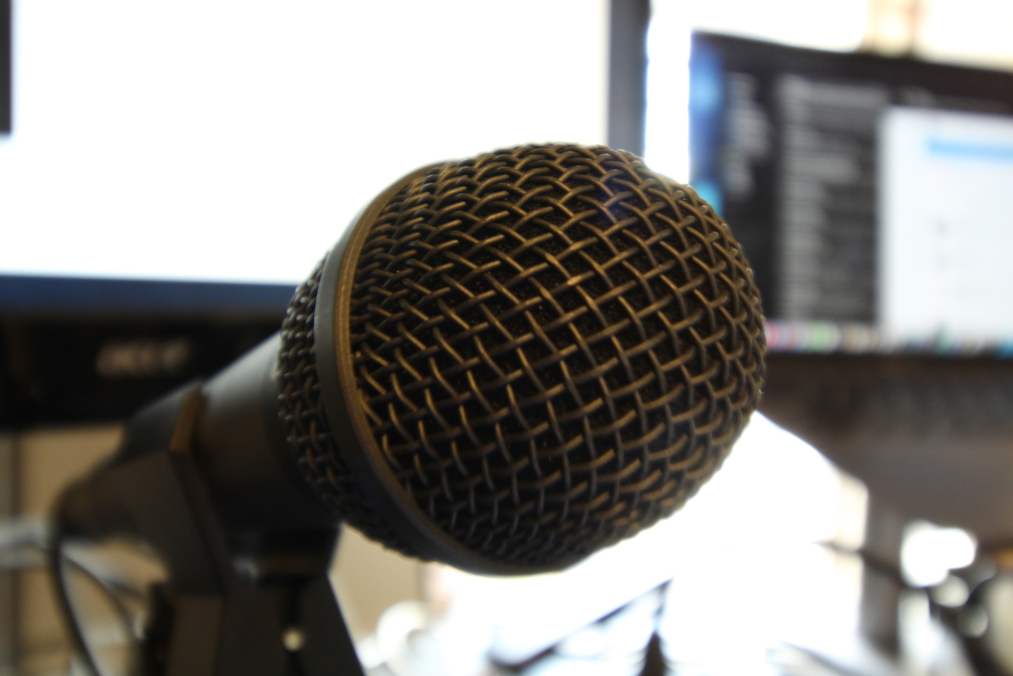 This is a close-up shot of the black mesh on one of the microphones available in the studio.